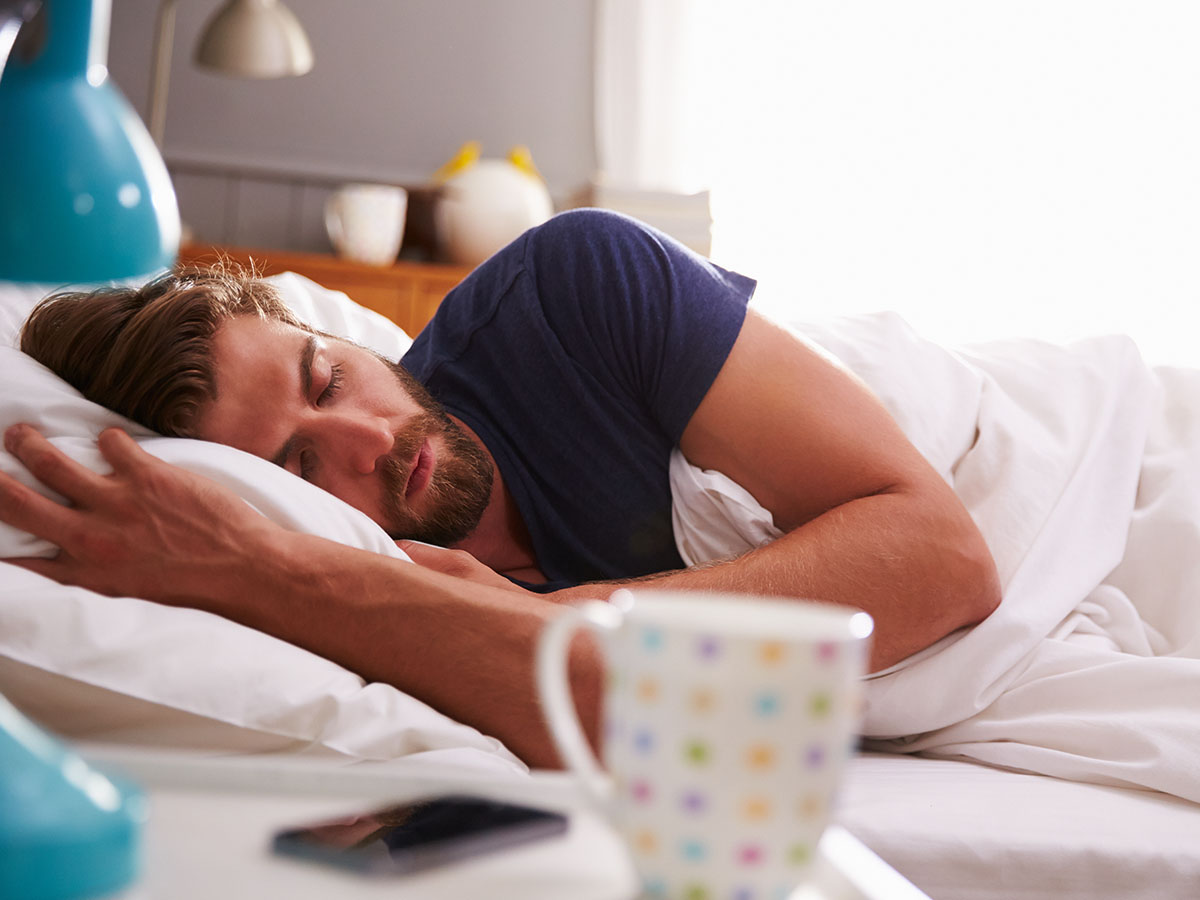 A man sleeping in bed